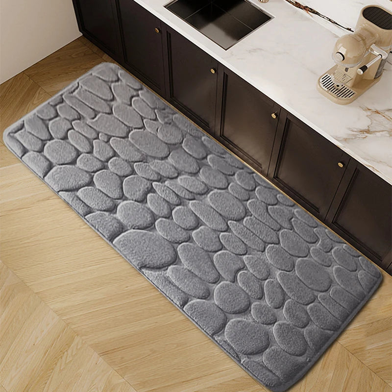 Thickened embossed water and oil absorbent carpet flannel