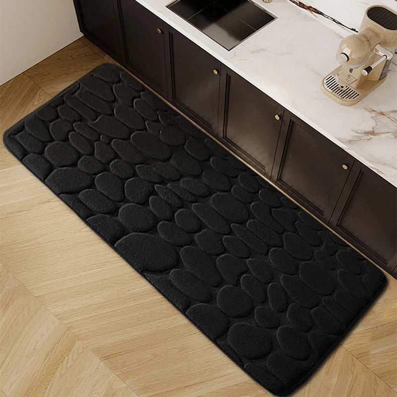 Thickened embossed water and oil absorbent carpet flannel